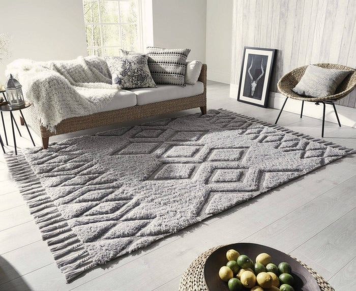 Quelle couleur de canapé va avec un tapis gris 