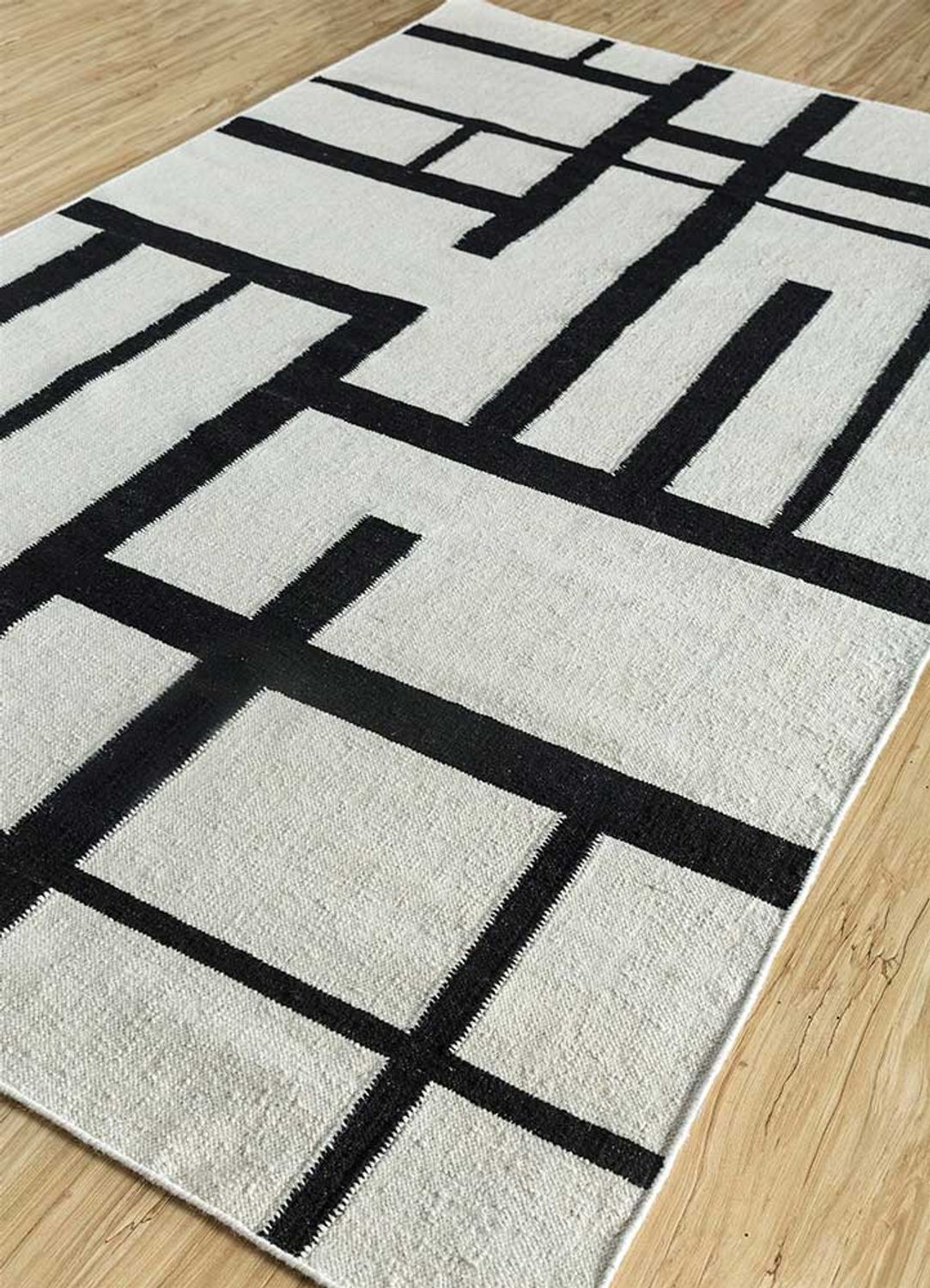 Tapis en laine - 240 x 150 cm - noir et blanc