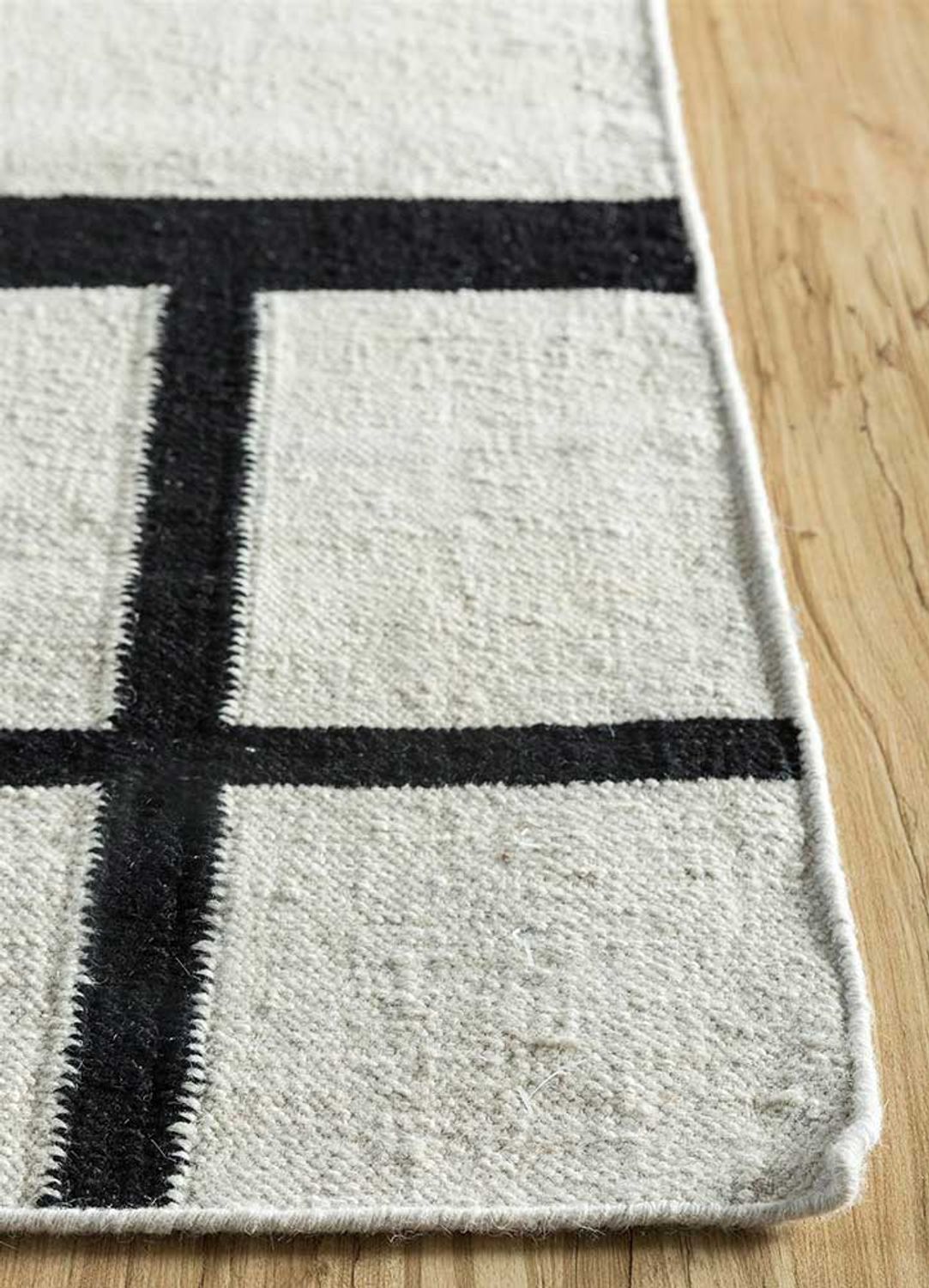 Tapis en laine - 240 x 150 cm - noir et blanc