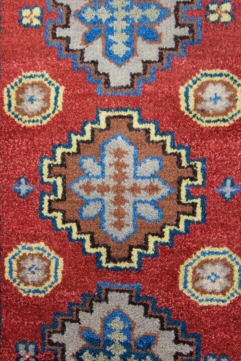Tapis oriental - 124 x 63 cm - rouge