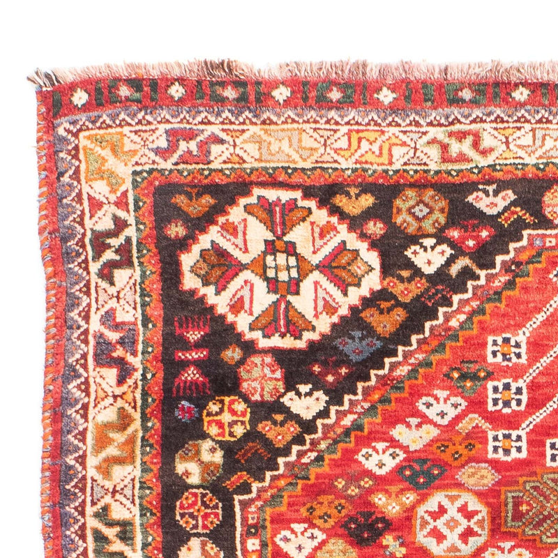 Tapis persan - Nomadic - 171 x 110 cm - rouge foncé