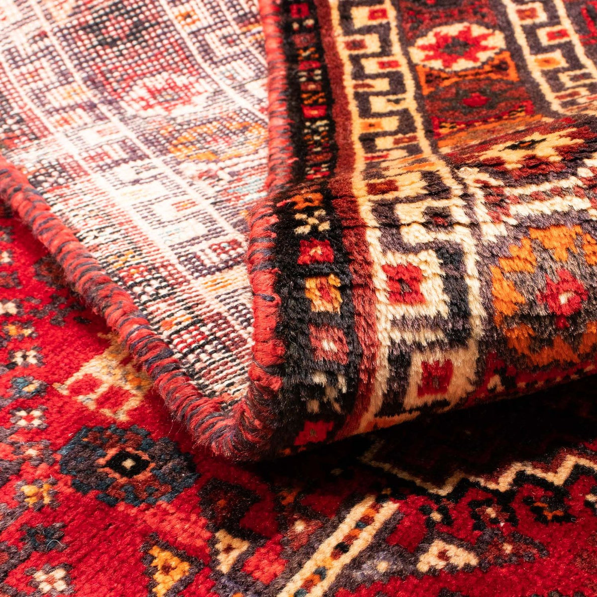 Tapis persan - Nomadic - 170 x 116 cm - rouge foncé